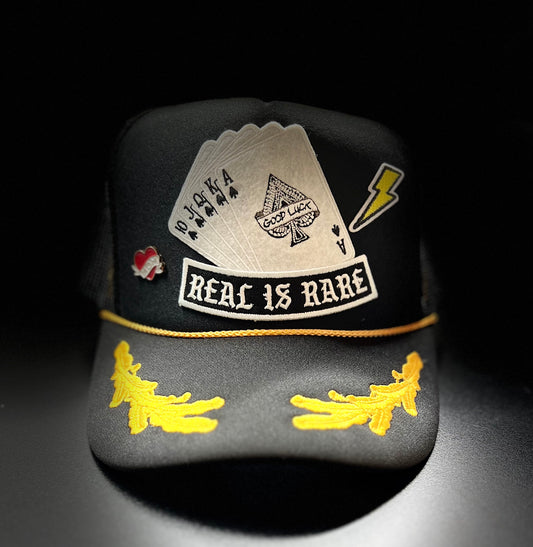 REAL IS RARE TRUCKER HAT